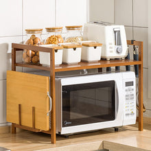 Load image into Gallery viewer, Micro-Ondes Rack, 2 Couches Support de Four à Micro-Ondes en bambou, Ajustable Etagere Rangement Cuisine avec 4 Crochets Et Support de Planche à Découper
